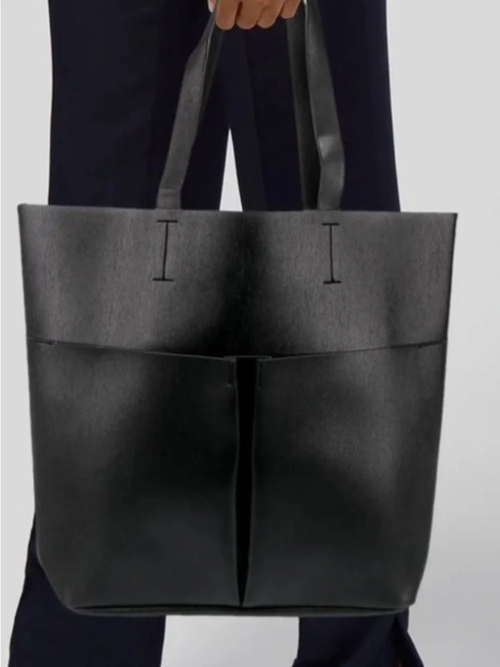 Neiman Marcus black faux leather tote bag with front pockets